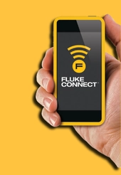 Fluke Connect logo on a mobile phone screen in an engineers hand